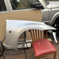 Nissan 370z Passenger Side Fender And Stock Wheels 