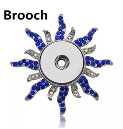 Blue and crystal sunburst 18mm snap button brooch