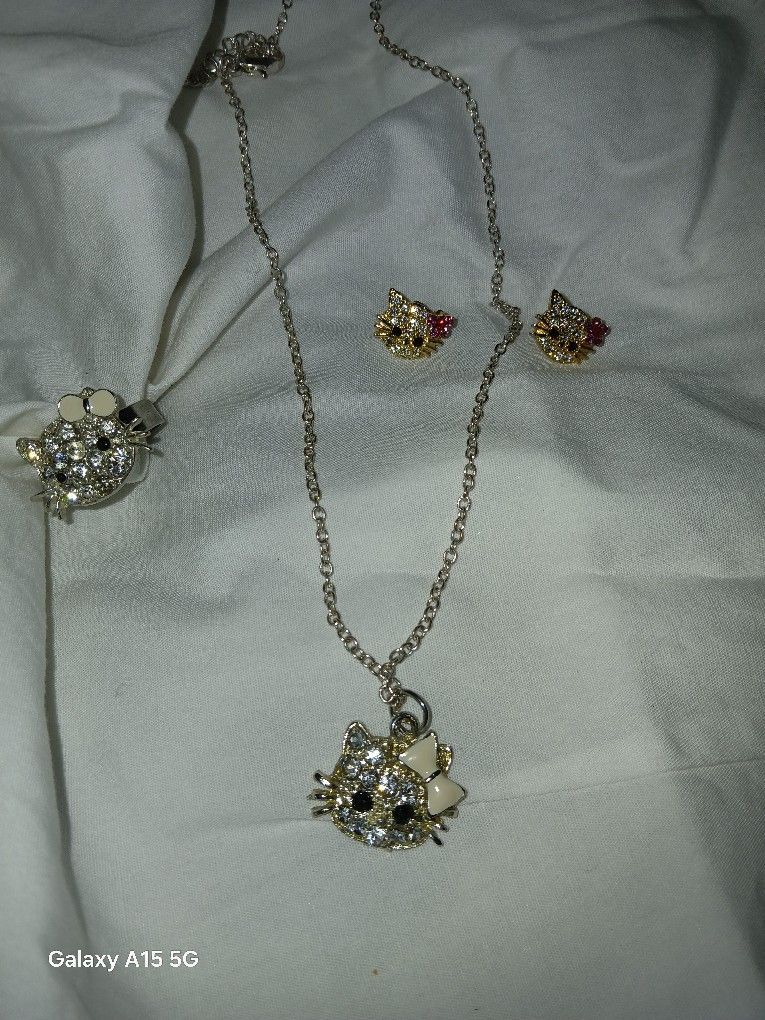 8$ OBO 4 PIEACE HELLO KITTY EAR RING,NECKLACE & RING SET 8$ Obo