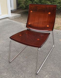 2 red acrylic chairs - $40