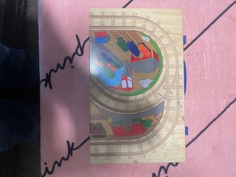 All wood toy train travel case with play surface.
