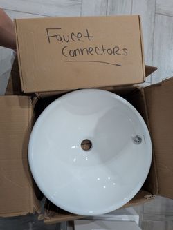 2 Round sinks with faucet connectors
