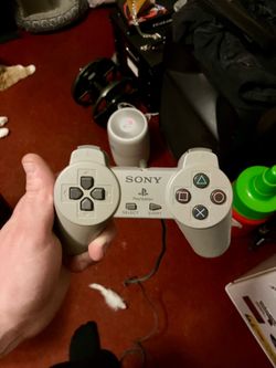 2 PlayStation 1 controllers
