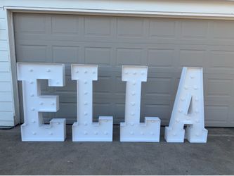 2x4 marquee letters that spell ELLA