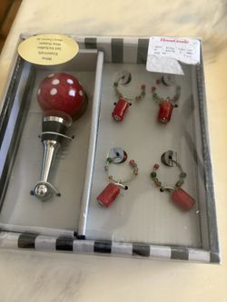Wine, stopper, and wine charms