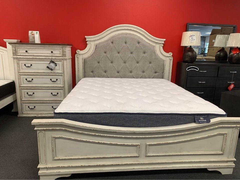 Realyn Two Tone Upholstered Panel Bedroom Set 4 Piece
Ashley Furniture$10 Down Payment And Financing Available