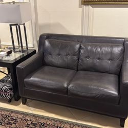 2 Leather Couches With Ottoman 
