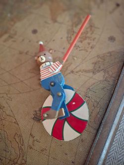 Vintage wooden balancing bear unicycle toy