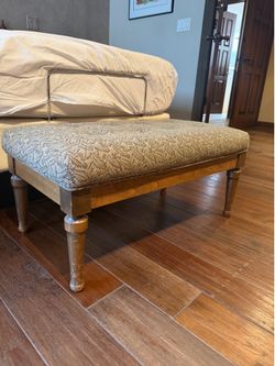 Vintage upholstered footstool ottoman