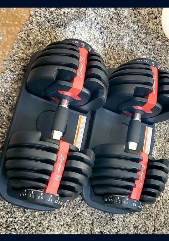 NEW ADJUSTABLE DUMBBELS 5-52.5 POUNDS
