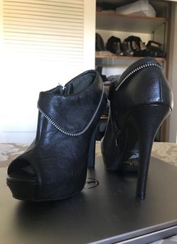 Black leather high heels size 6.5