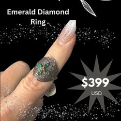 Beautiful marquise Emerald & Diamond Ring