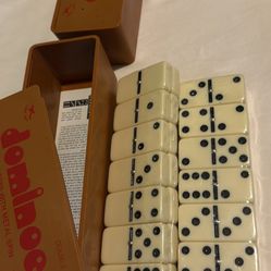 3  packs of all urea Is pieces with metal spin dominoes for sale  Asking price is $45.00