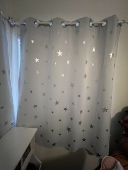 $10- Pair of Star Print Curtains