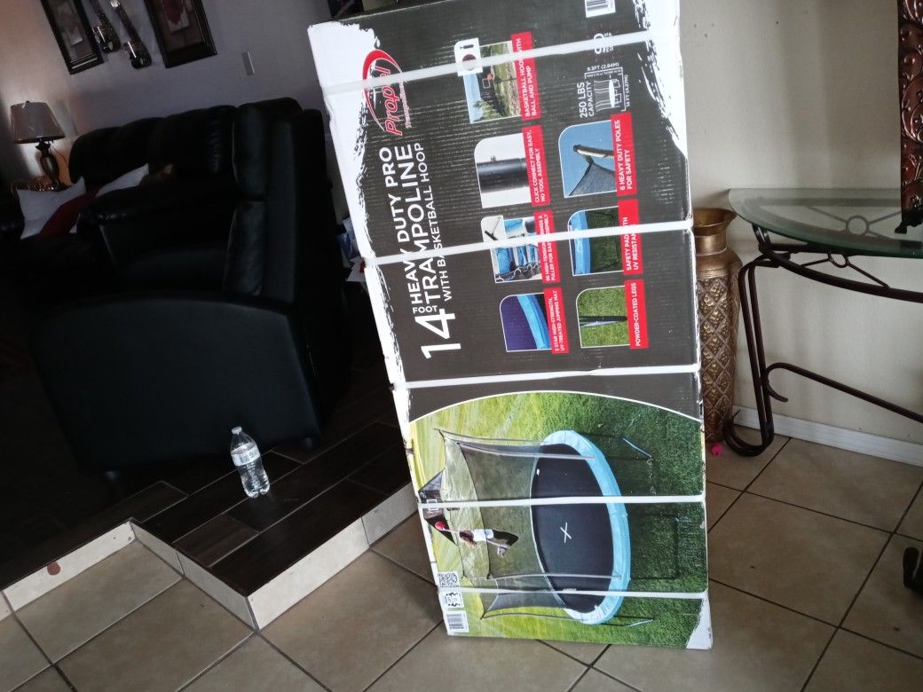 Propel 14 " trampoline new in box with basketball hoop $320