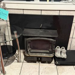 Cast-iron fireplace.  