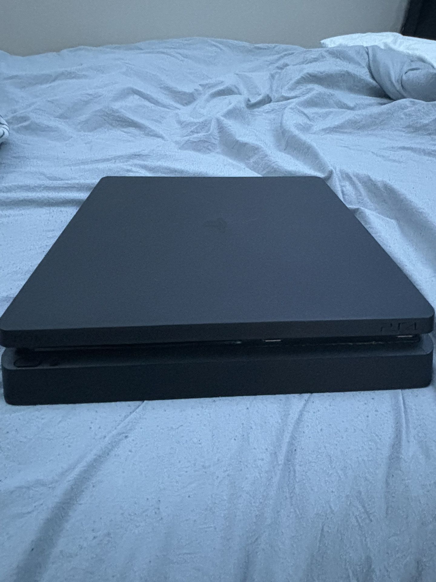 PS4 SLIM (comes with power and hdmi cord)
