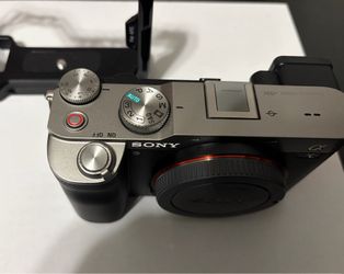Sony A7C mirrorless camera with lens and cage