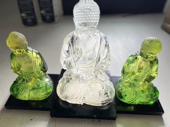 Three Buddha statues