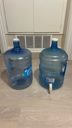 2x 5 Gallon Water bottles - one with spigot