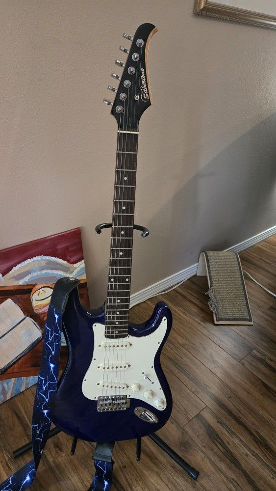 Silvertone guitar and amp (stand included)