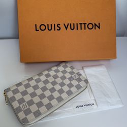 Authentic Louis Vuitton large zip around organizer wallet azure great condition with box