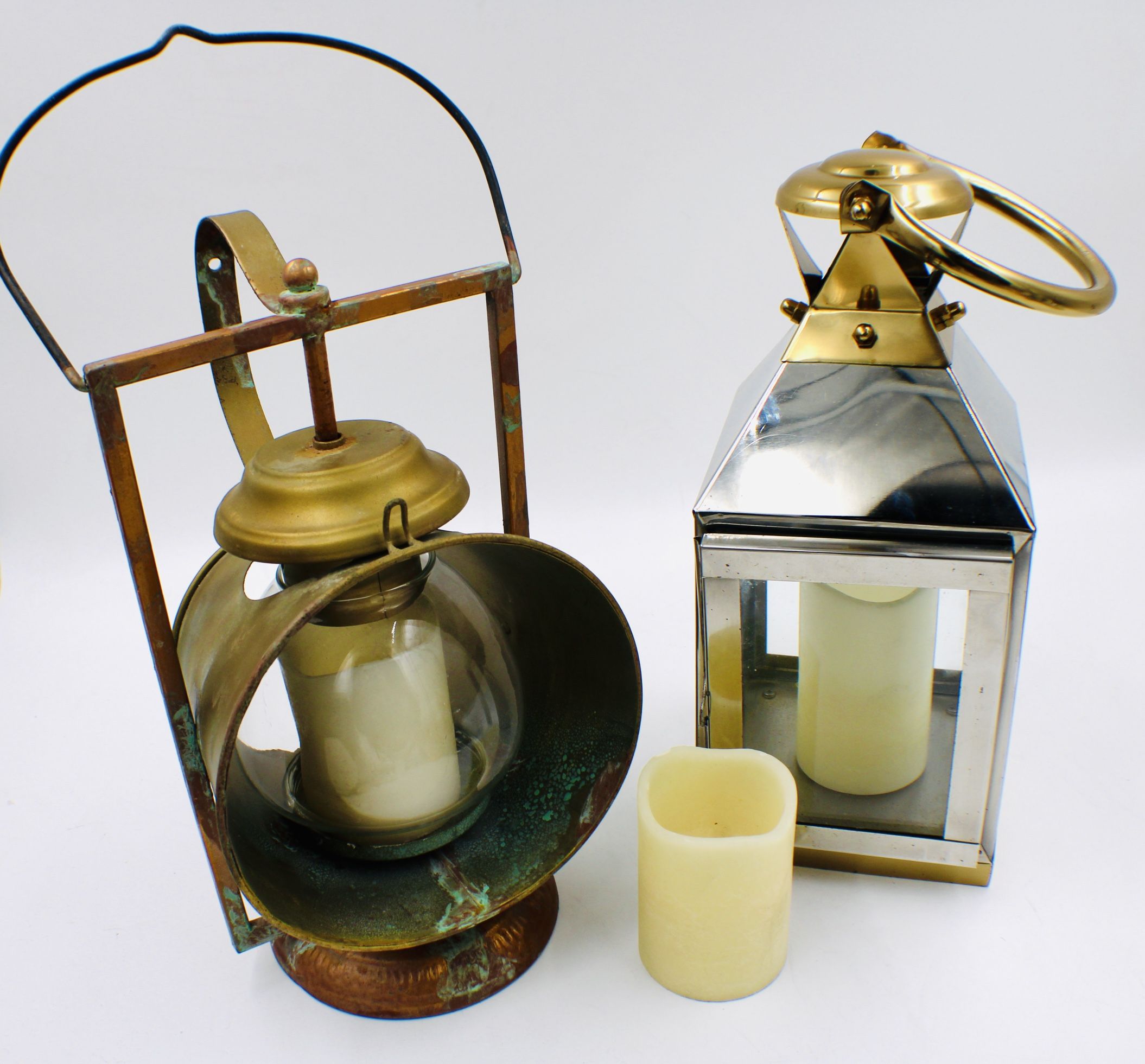 2 lanterns (vintage style and one modern)with 3 LED wax candles.