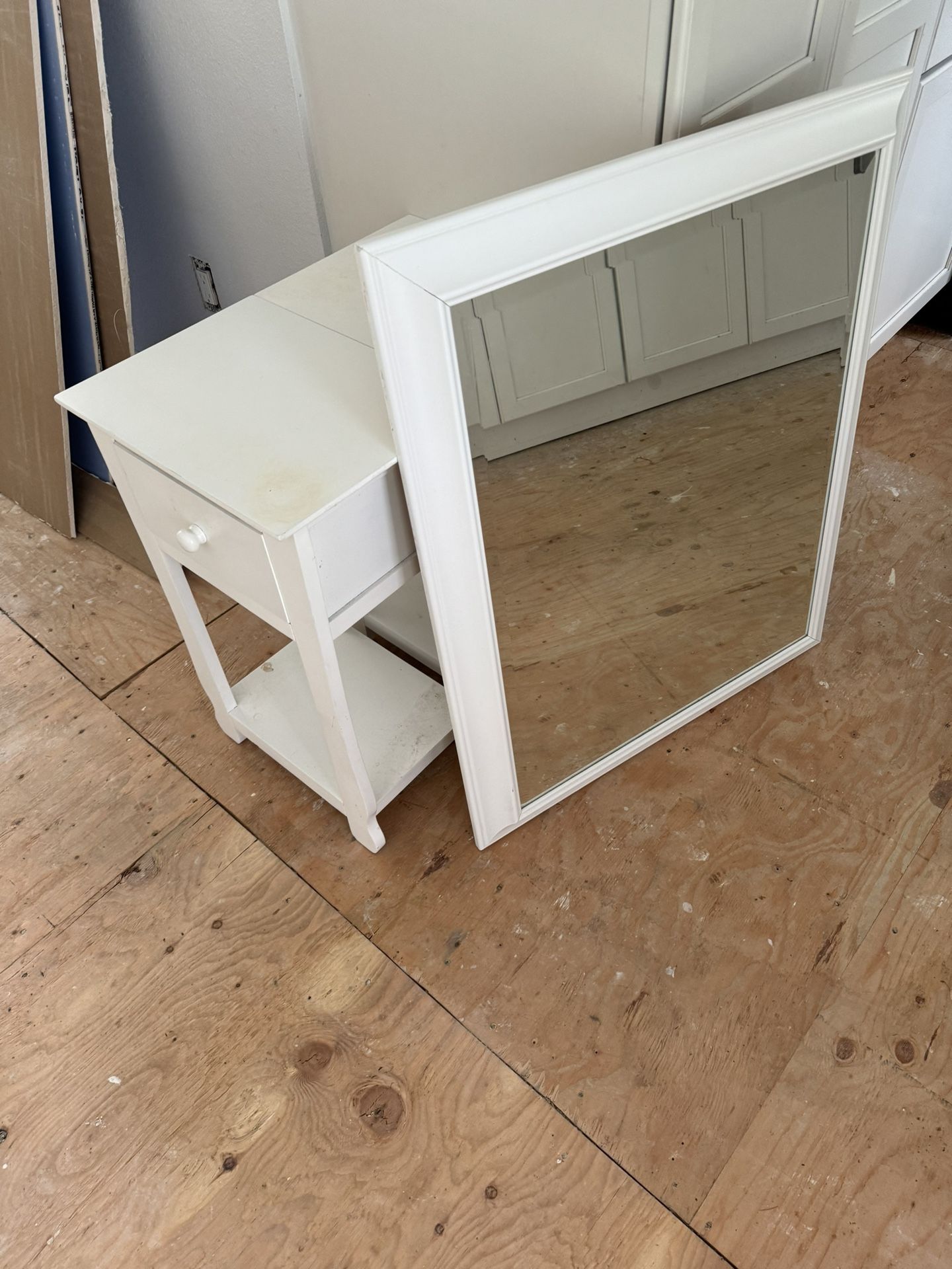 Two nightstands and mirror