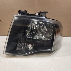 OEM 2007-2014 Ford Expedition Black Headlight Driver Side