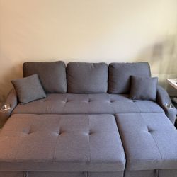 Like New! Grey Extendable Sofa . Barely Used, non smoking , non pet environment