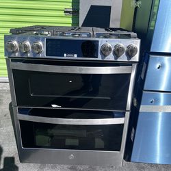 Refrigerador and stove  Stainless  Ge   Profile  stainless   New  is open box