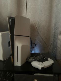 PlayStation 5 slim with 2 controllers and all the wires