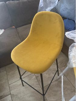 Set of two velvet yellow bar stools