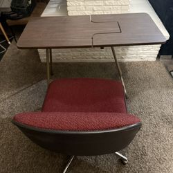 Wooden desk with red upholstered chair. 42"x20"x 27"