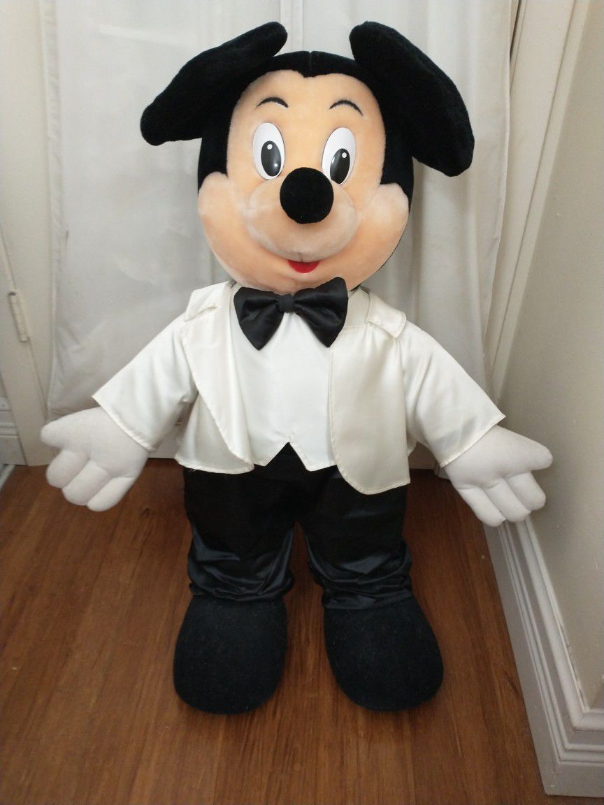 Mickey Mouse!! He stands 30" high and is dressed in his tux, sure to impress! Your little one(s) will LOVE him!! 
