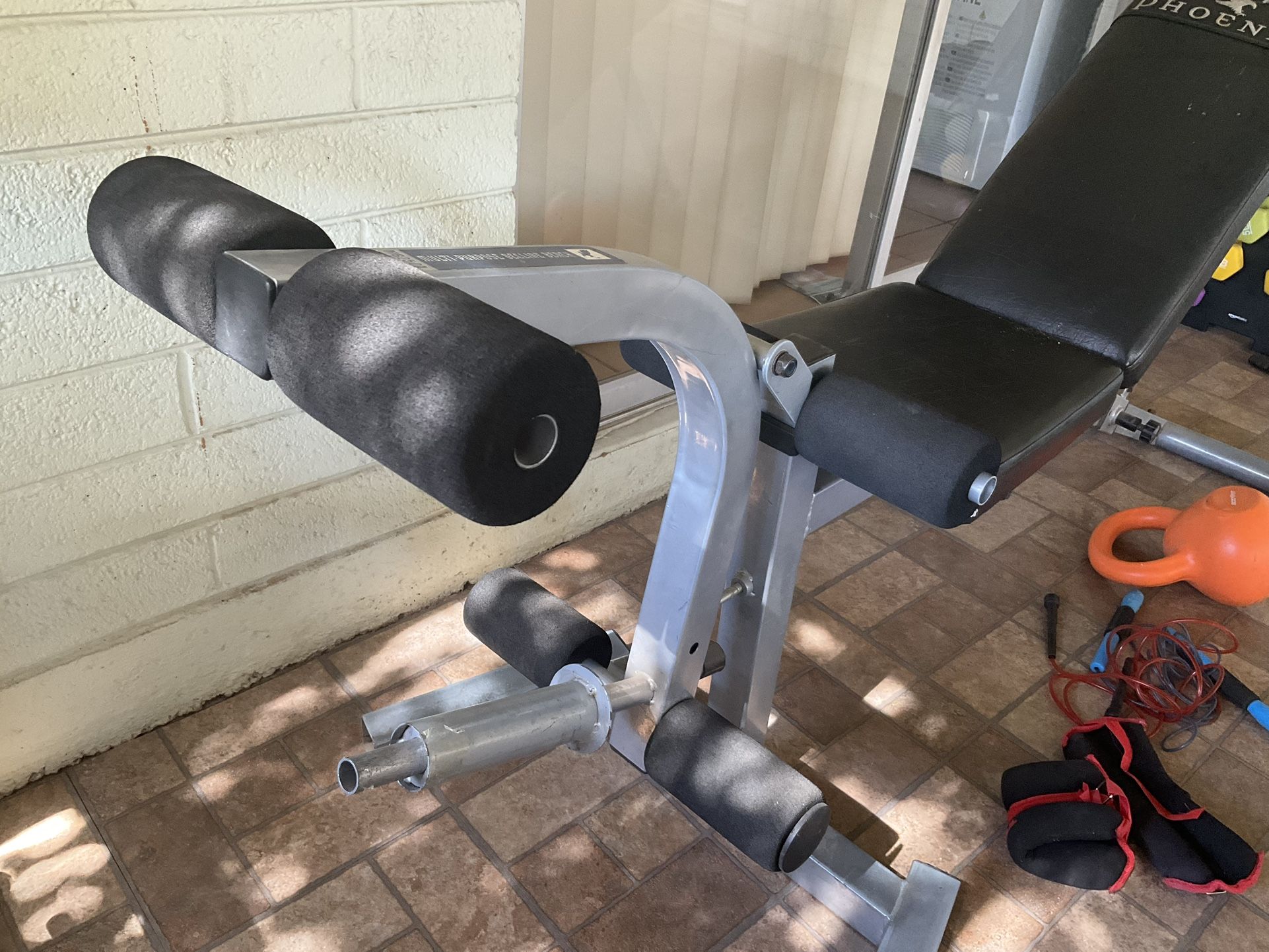 Weight Bench And Orange Kettle