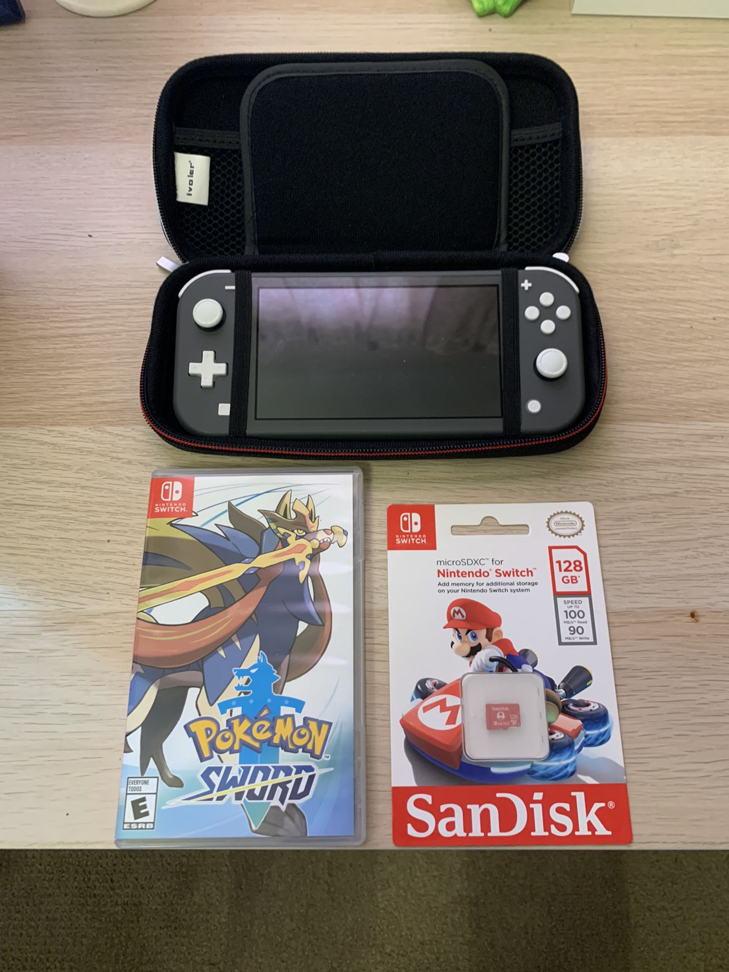 Nintendo Switch Lite, Pokémon Sword, and 128GB memory card