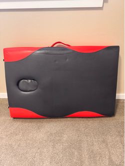 Massage table