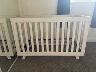 white baby crib
