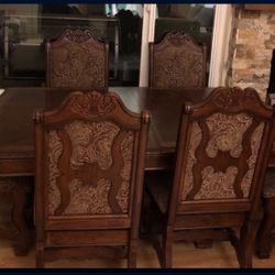 large brown dining table from room to go