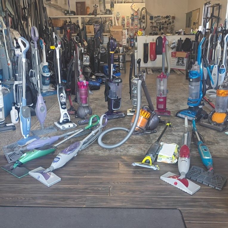 Vacuum Cleaners, Steam Mops, Canister Vacs,And Mops