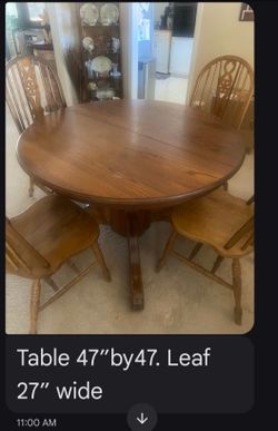 Table with leaf and 4 chairs