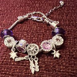 Charm bracelet with lock and charms