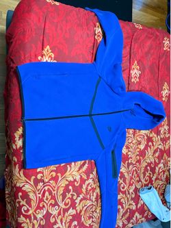 Blue Nike tech size M