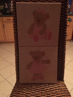 "it's a girl" wall decor with diaper holder
