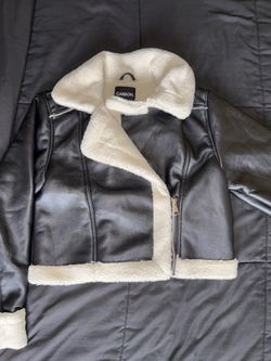 Black leather jacket with fur lining