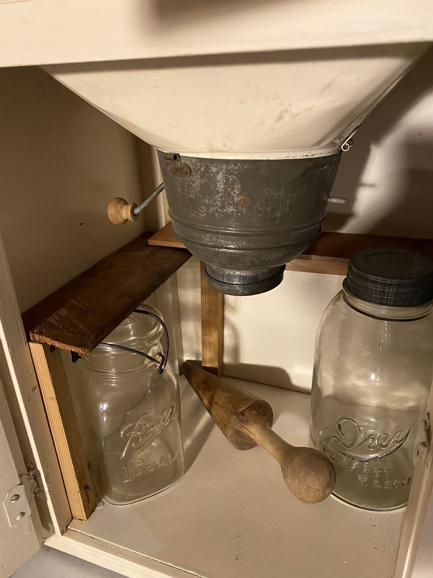 Antique Hoosier with metal enameled pull out table roll door