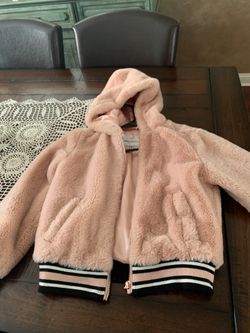 Girls fur jacket in size 14