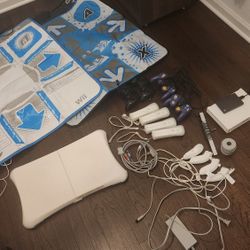 ULTIMATE COMPLETE BUNDLE Nintendo wii,  with 4 remotes, 100+ games, ddr pads, wii fit board and Tons More