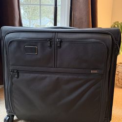 NEW Tumi 4 Wheeled Black Suitcase 